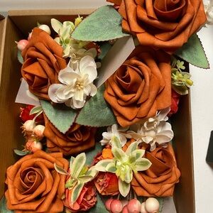 Rust Orange and White Floral corsage and boutonnière.